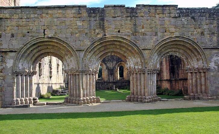 View of Fountains Abbey in North Yorkshire showing the round arches typical of Romanesque architecture