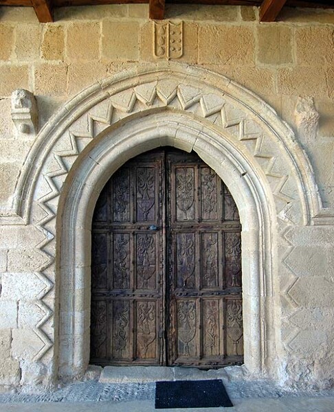 An archway with a zigzag (chevron) pattern, at the convent of Gradefes in Spain. The chevron is used to great effect in Durham Cathedral, especially in the late twelfth century Gallilee Chapel