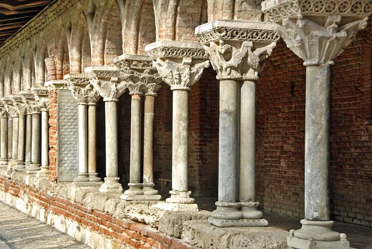 Detail of the cloisters at the Abbey of St Pierre de Moissac, France. Completed circa 1100. The capitals of the columns in the cloisters at Moissac are among the earliest and finest examples of figural stone carving in Romanesque architecture. They narrowly escaped demolition at the end of the nineteenth century to make way for a railway line!