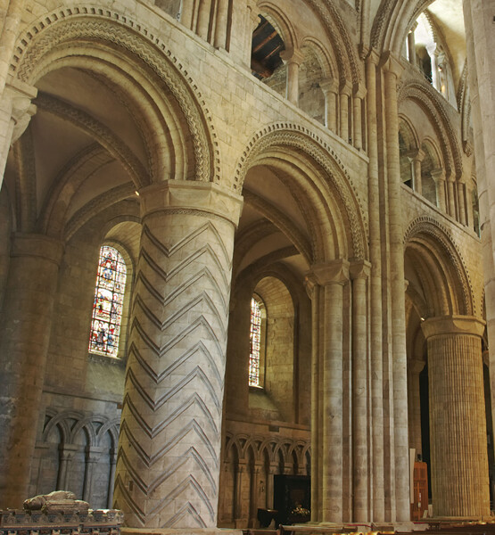 The geometric designs carved in the stone pillars of Durham Cathedral were common in Norman architecture. The specific details of these suggest that the masons who carved them also worked on Lindisfarne Priory to the North of Durham. 