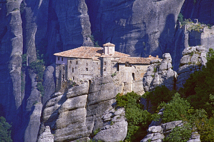 The meteora are enormous masses of sandstone shaped by seismic activity into free-standing columns of rock. The name 