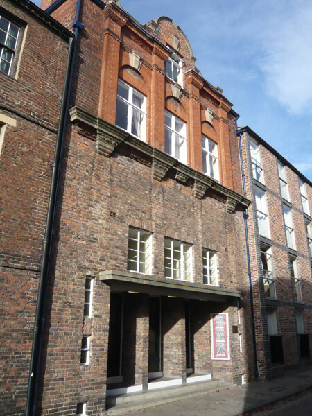 The Assembly Rooms, now Durham University's Assembly Rooms Theatre, is an eighteenth century building, modernised in the nineteenth century, and again in the 1930s. Much of remodelling seems to have concentrated on the exterior, which now combines a Victorian facade with an entrance that is typical of the 1930s Art Deco style. Originally the building hosted community events, such as dances.