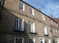 In Durham, many ordinary looking buildings are often older than they appear. Even a close look at their facades can reveal alot about their history, and the way they have been modified over time.