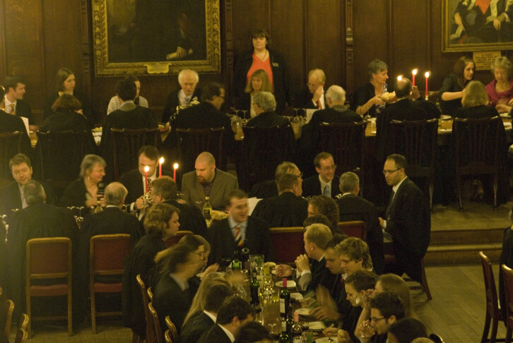 'Formals' as they are known, bring together the college's three common rooms. 'High table', slightly elevated from the rest of the hall,  comprises the members of the Senior Common Room and their guests, and sometimes members of the Middle Common Room as well. The hierarchical seating arrangement echoes the way the hall would have been used for banquets by the Durham Prince Bishops.