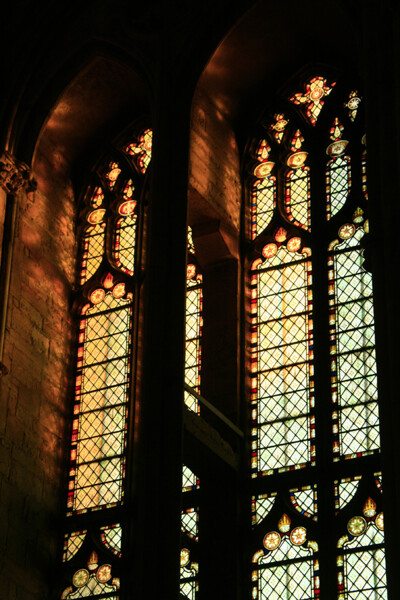 Detail of Stained Glass. The stained glass windows in Durham Cathedral are a medley of styles, depending on when they were created, and in most cases, redesigned, to replace destroyed originals. Plainer windows such as these are responsible for the infiltration of the most light into the building. 