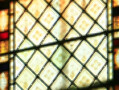 Detail of Stained Glass. The stained glass windows in Durham Cathedral are a medley of styles, depending on when they were created, and in most cases, redesigned, to replace destroyed originals. Plainer windows such as these are responsible for the infiltration of the most light into the building. 