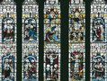 The Te Deum Window. This window was unveiled in 1869 in memory of Charles Thorp, Archdeacon of Durham, who was instrumental in the foundation of Durham University in the 1830s. The window cost 650 and incorporates some fragments of medieval glass in its upper sections. 