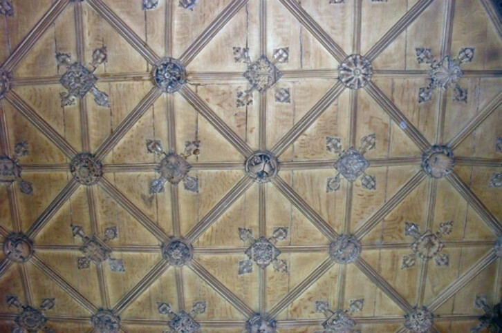 Today the Dean's dining room, the room with this finely-carved wooden ceiling hosted King James I who slept in it on his way to Scotland in 1603.