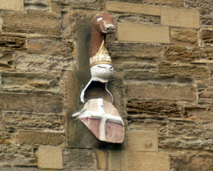 Coat of arms of Bishop Neville, who built in the Exchequer Building in the mid-fifteenth century.  The animal at the top is a bull that has lost its horns. 