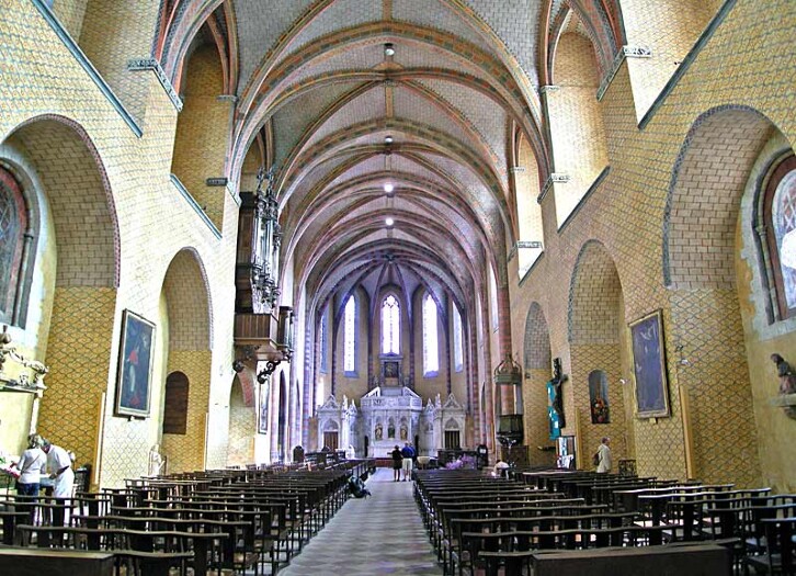 View of the nave of the abbey of St Pierre de Moissac, France, circa 1100. The repetitive patterns of the wall painting seen here, are extremely similar to traces of paint found in the side aisles of Durham Cathedral. They remind us of a fact often forgotten: that the interiors of most Romanesque buildings would have originally been very colourful.