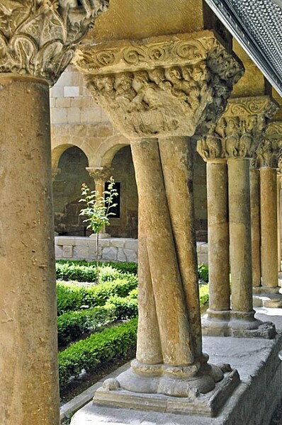 Detail of the colonnade at the Monastery of Santo Domingo de Silos, Northern Spain, 11-12th centuries. Buildings like this were the work both of their patrons and craftsmen, both of whom often wanted to impress others with their work. The group of columns pictured here is likely to have been a craftsman's touch. It is an example of an eleventh-century mason showing off his skill.  