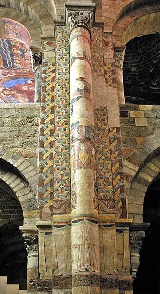 Interior of the Basilica of St Julian, Brioude, France. 11-12th centuries. The frescos show an interesting combination of geometric patterns, and representative scenes. The drapery painted at the base of the columns is similar to that in the Galilee Chapel of Durham Cathedral. Paint did much to soften the effect of stone. 