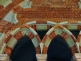 Detail of the east cloister of the abbey of Chiaravalle Della Colomba in Italy. The intersecting arches resemble those of Durham Cathedral