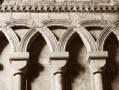 Detail of the intersecting arches in the nave at Durham Cathedral, circa 1100. The similarity of these arches to those in other buildings in Spain is testament to the cross-cultural influences that shaped medieval architecture, sometimes through the movement of craftsmen, at other times, because people travelled and returned home inspired by what they saw abroad.