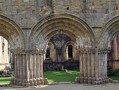 View of Fountains Abbey in North Yorkshire showing the round arches typical of Romanesque architecture