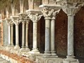 Detail of the cloisters at the Abbey of St Pierre de Moissac, France. Completed circa 1100. The capitals of the columns in the cloisters at Moissac are among the earliest and finest examples of figural stone carving in Romanesque architecture. They narrowly escaped demolition at the end of the nineteenth century to make way for a railway line!