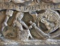 Detail of a stone font dating from circa 1150 and depicting its maker Richard of Durham. In St. Bridget's Church, Bridekirk.