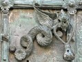 Troia Cathedral Doorknocker. Part of an elaborate bronze door made in 1119, Troia Cathedral, Italy. Unlike the Sanctuary Knocker at Durham Cathedral, the dragon here looks almost friendly. In terms of their concept though, the two knockers have something in common. 