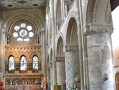 View of the nave of Waltham Abbey, England, mid 12th century. The abbey is contemporary with the nave of Durham Cathedral, and in fact looks quite similar. The stone for the construction was probably imported from Caen in Normandy, a common practise in Norman times, (though not the case in Durham, where the stone was local).  