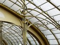 The fluid lines of the Art Nouveau style are exemplified in four late 19th century Brussels townhouses designed by Victor Horta. Horta's buildings are characterised by their open plan, the diffusion of light, and the brilliant joining of the curved lines of decoration with the structure of the building. 